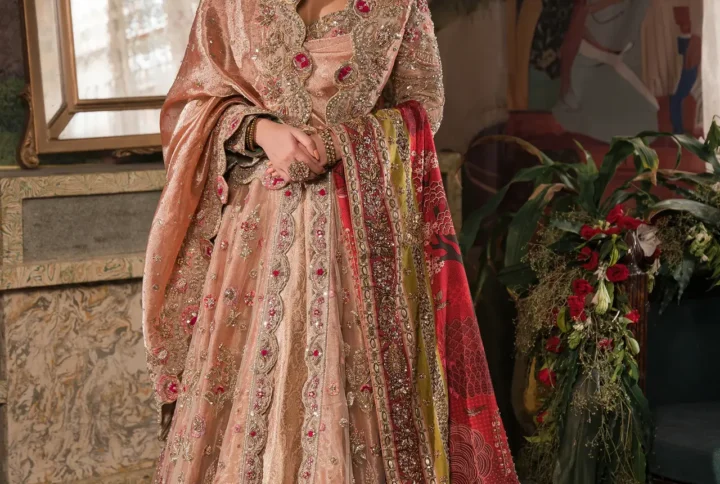Coral Barat Bridal Dress with gold zardozi and resham work.