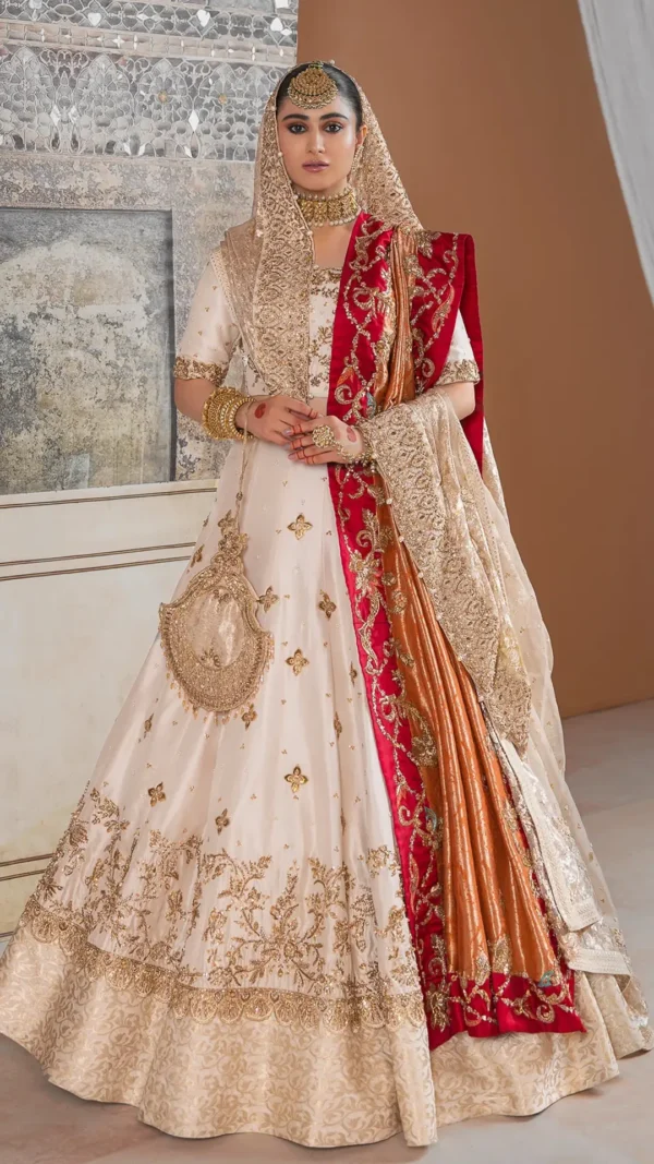 Ivory bridal lehenga with gold accents