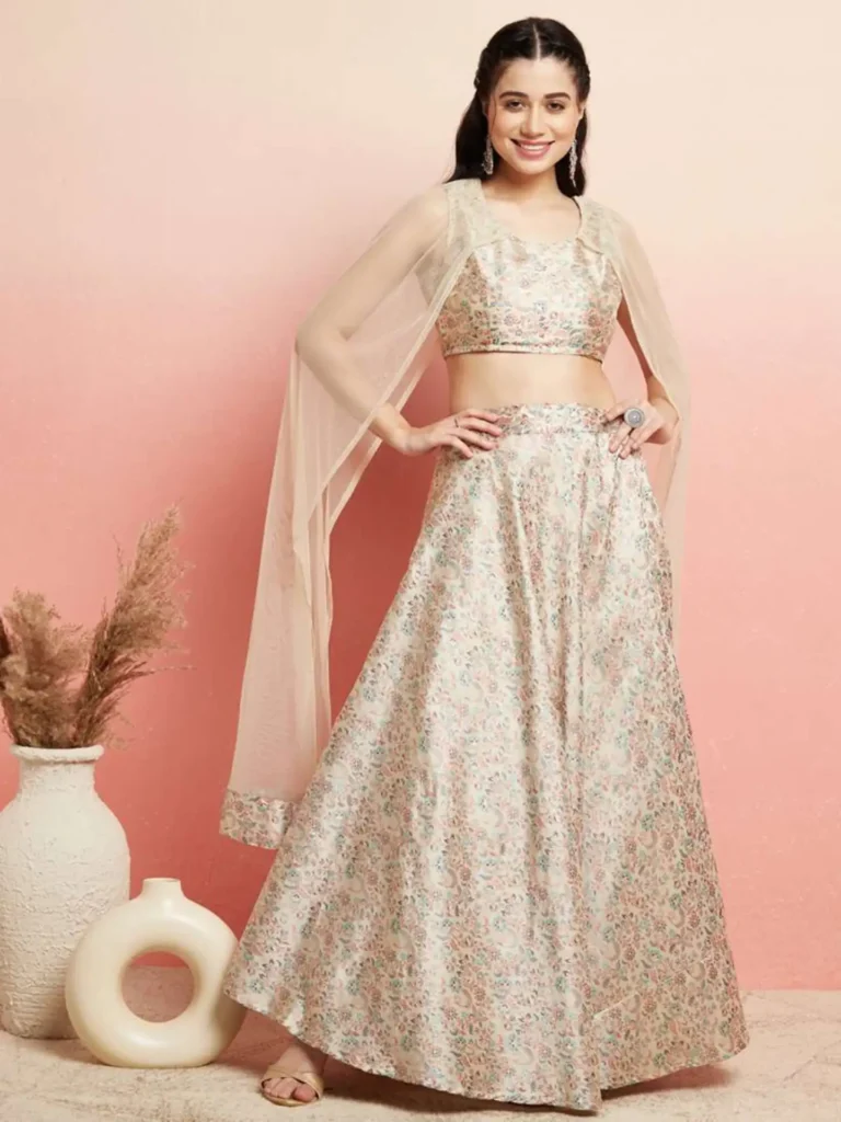 Cape-style dupatta on lehenga choli for 2025 bridal trends